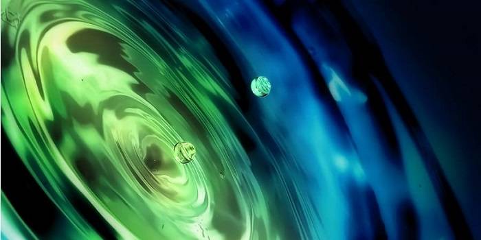 #caption4 colored water surface with waves and wripples coming from the center