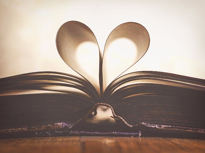 pages of book shaped into a heart